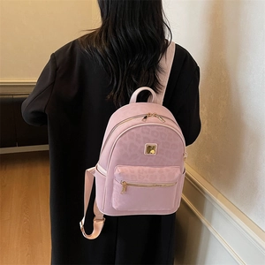 Pink leopard print backpack for women featuring minimalist vintage style and large capacity