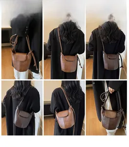 Close-up views of models wearing the brown matte leather bucket bag in a casual indoor setting