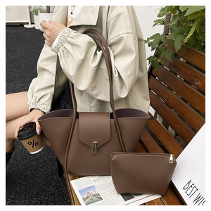 Brown litchi grain leather tote bag set shown with a small matching zipper pouch