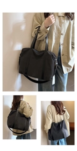 Three-view display of black large capacity canvas tote with leather straps and shoulder belt