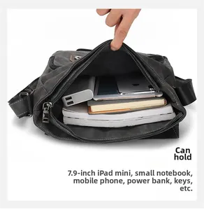 Internal capacity of dark grey messenger bag showing space for 7.9-inch tablet and gadgets