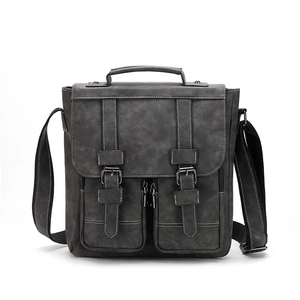 Deep grey matte retro messenger bag with contrast stitching and adjustable shoulder strap