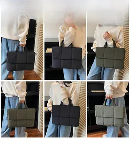 Detailed views of quilted square tote bags in black, dark green, and light grey