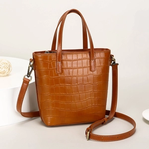 Retro brown crocodile pattern bucket bag with top handles and adjustable strap