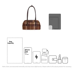 Detail view of brown checkered shell bag interior capacity for phone and cosmetics