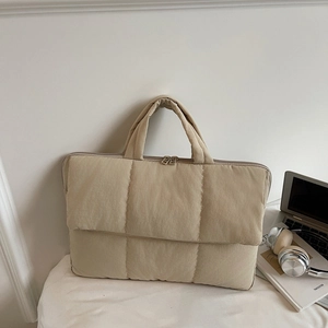 Minimalist beige quilted laptop handbag with bubble cotton texture and double zippers