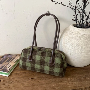 Retro forest green plaid shell bag with dark brown leather straps and double zipper detail