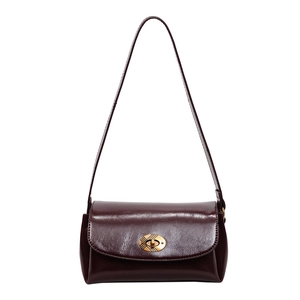 Vintage dark wine red shoulder bag with glossy leather finish and gold oval metal lock