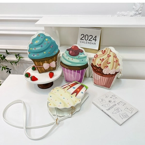 Detailed view of cupcake-shaped PU leather crossbody bags in various pastel colors