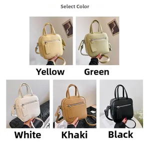 Detailed view of the mini square shoulder bag in yellow, green, white, khaki, and black