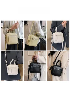 Chic small square crossbody bag shown in beige, yellow, and black on a model