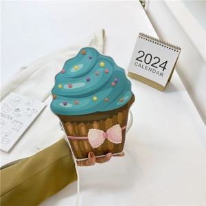Creative cupcake shaped crossbody bag in blue and brown PU leather with a pink bow