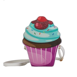Creative cupcake-shaped shoulder bag in colorful pastel faux leather with cherry detail