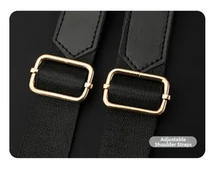 Detail view of adjustable black nylon straps with gold metal buckles on a backpack