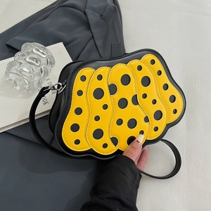 Borsa a tracolla moderna a onde con pois gialli e neri e sottile tracolla regolabile