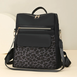 Leopard print patchwork backpack for women with gold zippers and tassel detail