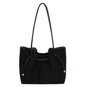 Minimalist black faux suede large tote bag with golden ball charm and long shoulder straps
