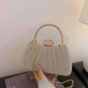 Sparkly evening bag with crown clasp, pearl handle and gold chain for women