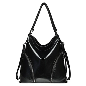 Classic black high-capacity faux leather shoulder tote bag with decorative zippers