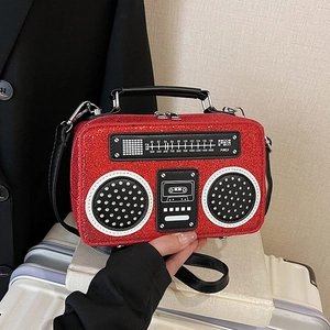 Retro red glitter radio-shaped crossbody bag with vintage dial and black shoulder strap