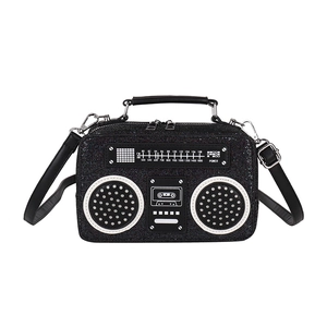 Retro radio shaped crossbody bag with black glitter finish and silver hardware details