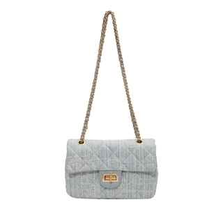 Elegant light blue tweed quilted shoulder bag with gold chain strap and metal lock