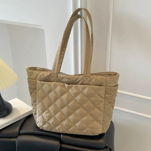 Minimalist khaki quilted tote bag with diamond lattice pattern for commute
