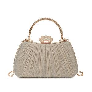 Elegant gold pleated evening clutch bag with rhinestone clasp and metal chain strap