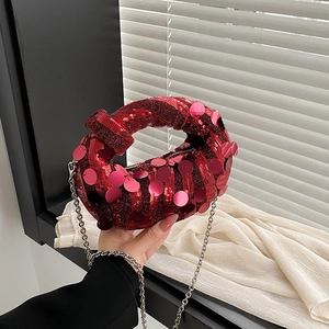 Chic red sequin cloud bag with knotted handle and elegant silver chain strap