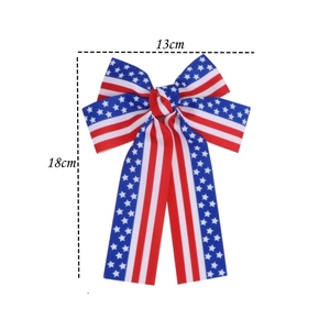Detailed size specifications for the patriotic 13cm by 18cm American flag bow hair clip