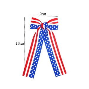 Independence Day hair bow with American flag stripes and stars pattern, 19cm length