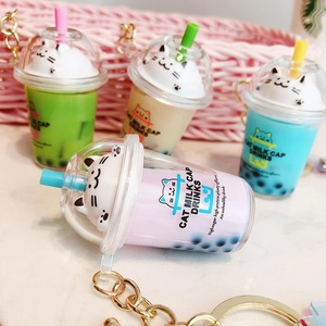 Cute Cat Milk Tea Cup Keychain With Liquid Quicksand Moving Artificial Pearls Acrylic Pendant Silicone Wrist Strap Bell