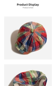 Detail view of colorful plaid newsboy hat featuring elastic band and soft inner lining
