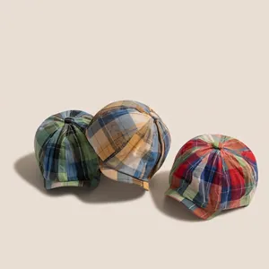 Classic plaid newsboy caps for kids in three colorful patchwork patterns and textures