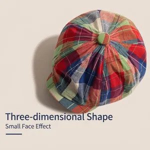 Classic plaid newsboy cap for kids featuring a vintage colorful tartan pattern and button top