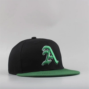 Detail view of 3D embroidered Gothic letter A on black and green flat brim hip-hop hat