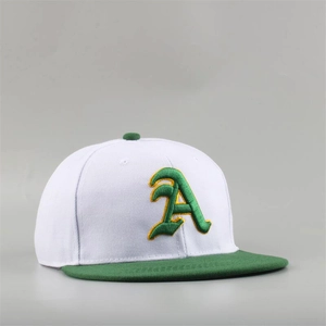 Detail shot of 3D embroidered green and yellow letter A on a white twill cotton baseball cap