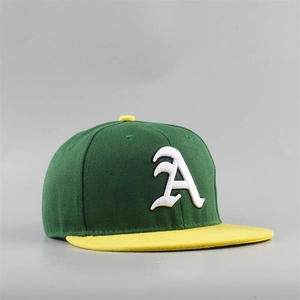Close-up of 3D letter A embroidery on green and yellow two-tone flat brim baseball cap
