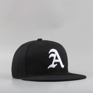 Close-up of gothic white embroidered letter A on black flat brim cotton snapback hat