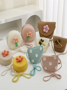 Kids woven straw crossbody bags with cute floral charms in assorted pastel colors