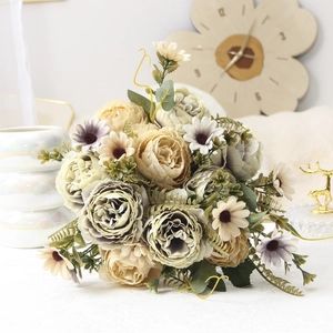Close-up of artificial peony and rose bouquet in Morandi tones for home decoration