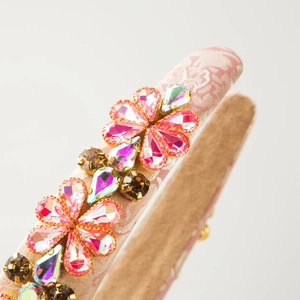 Elegant Baroque pink headband featuring sparkling crystal floral patterns on luxury jacquard