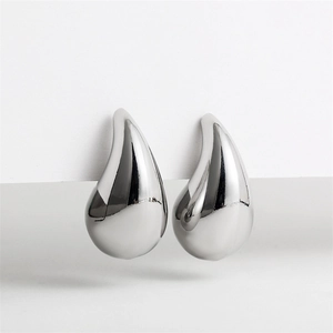 Elegant silver teardrop earrings with high-polish mirror finish in minimalist style