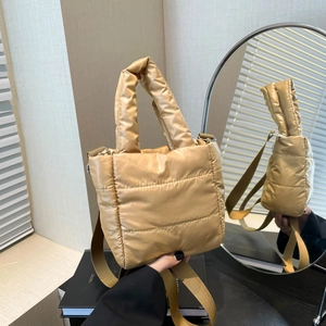 Champagne gold quilted puffer handbag with adjustable strap for women in high-gloss nylon