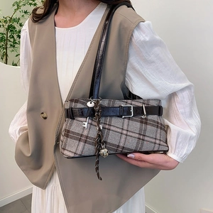 Retro plaid boston bag with faux leather straps and decorative charms for autumn wear