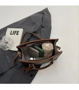 Detailed interior view of tote bag showing large capacity for umbrella and phone