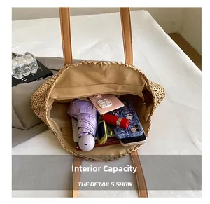 Top view of woven straw shoulder bag showing large internal capacity for daily items