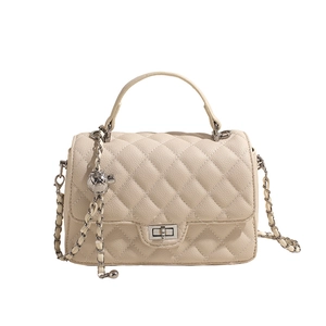 Off-white quilted chain crossbody bag with silver hardware and metal ball charm