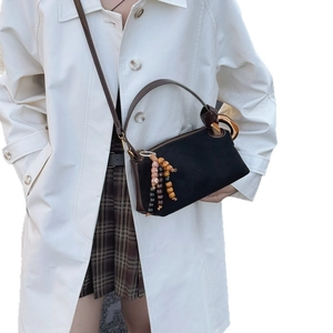 Vintage matte Boston shoulder bag in black and brown leather with beaded tassel detail