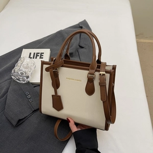 Chic cream and brown color-block tote bag with adjustable strap for office commuting